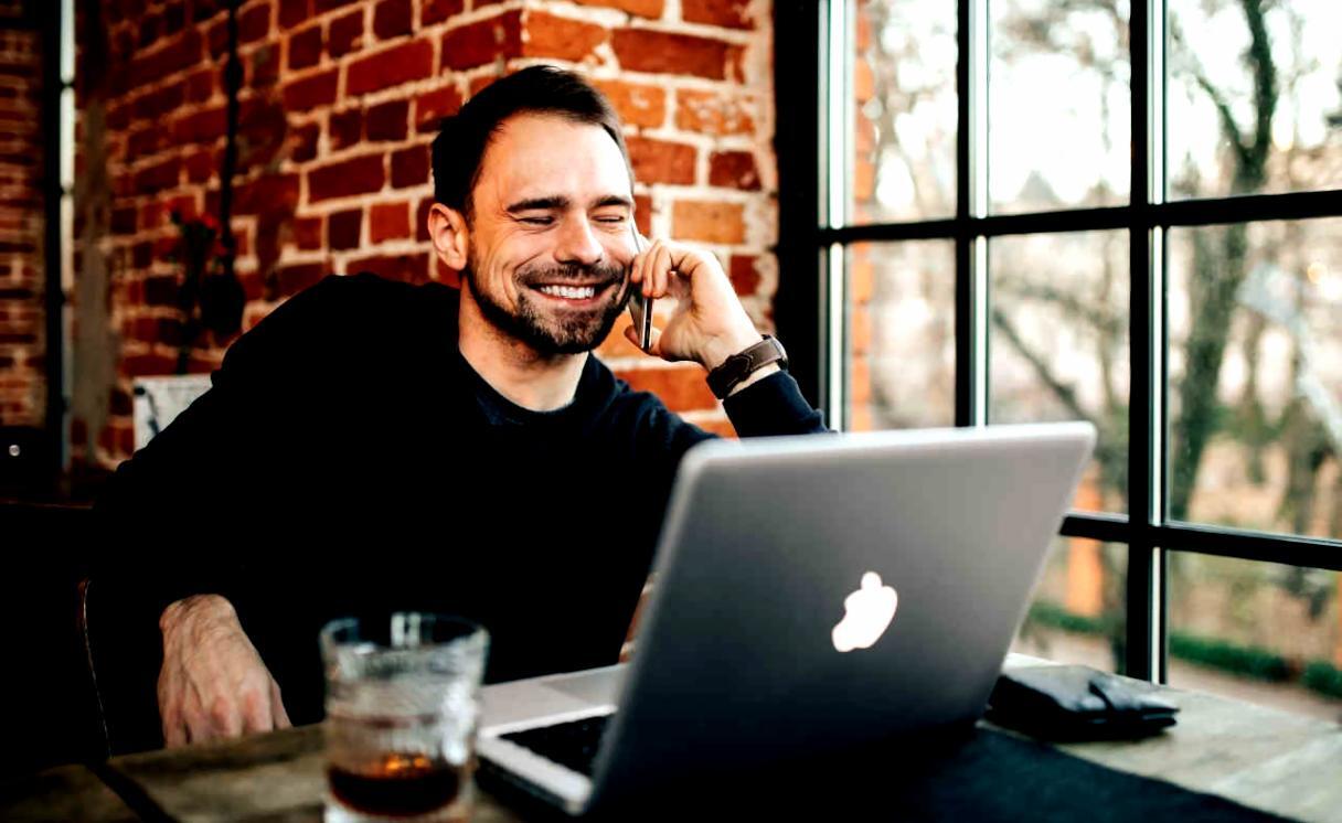 Science journalism student conducting interview with researcher in laboratory setting