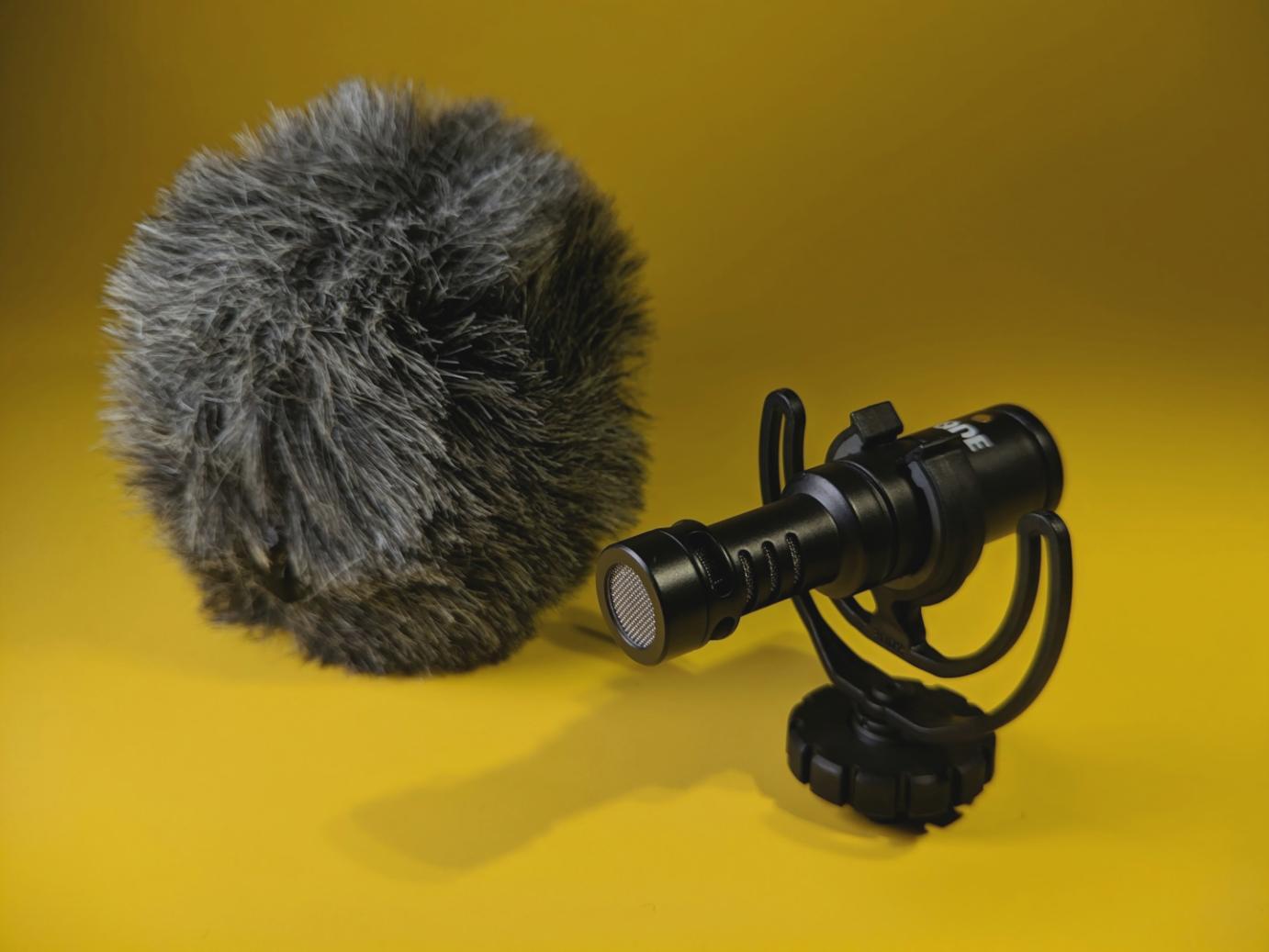 Students collaborating on science communication research project in modern workspace